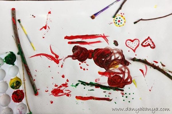 Painting with and on sticks by Danya Banya