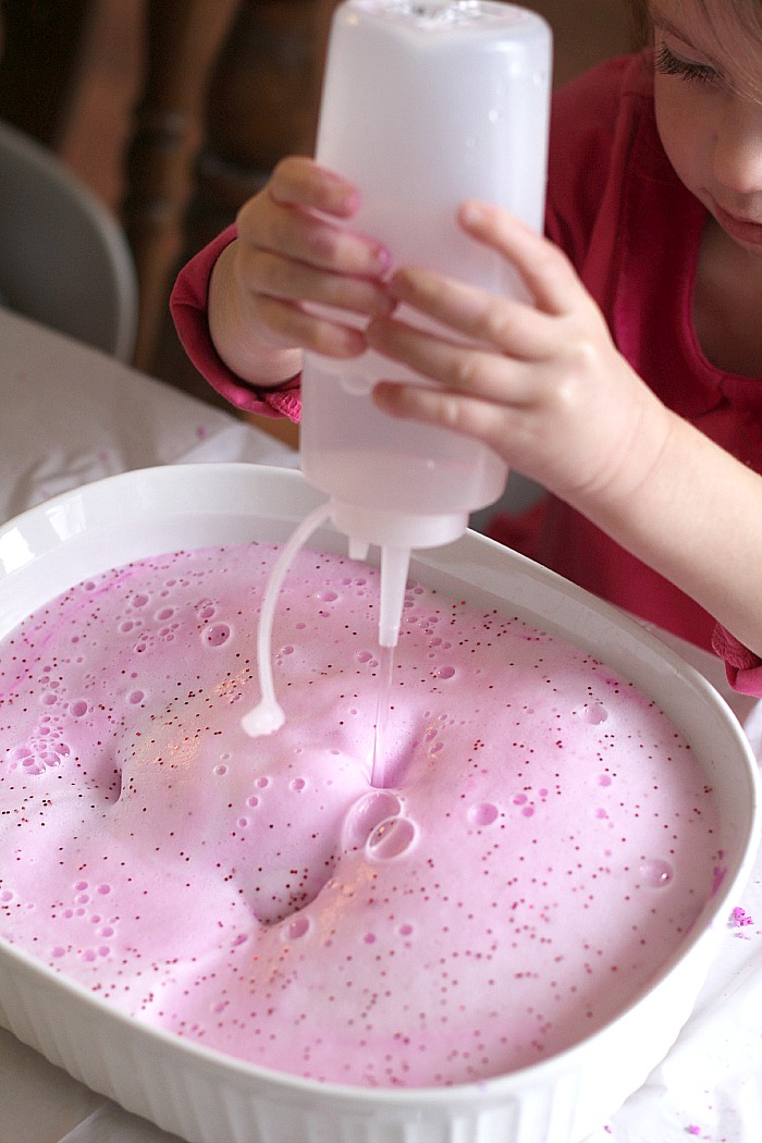 squirting vinegar on foaming heart dough squirting vinegar on foaming heart dough