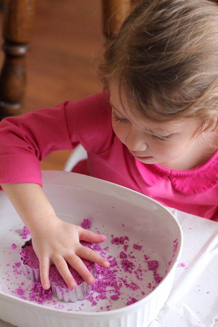 pressing down the foaming heart dough pressing down the foaming heart dough