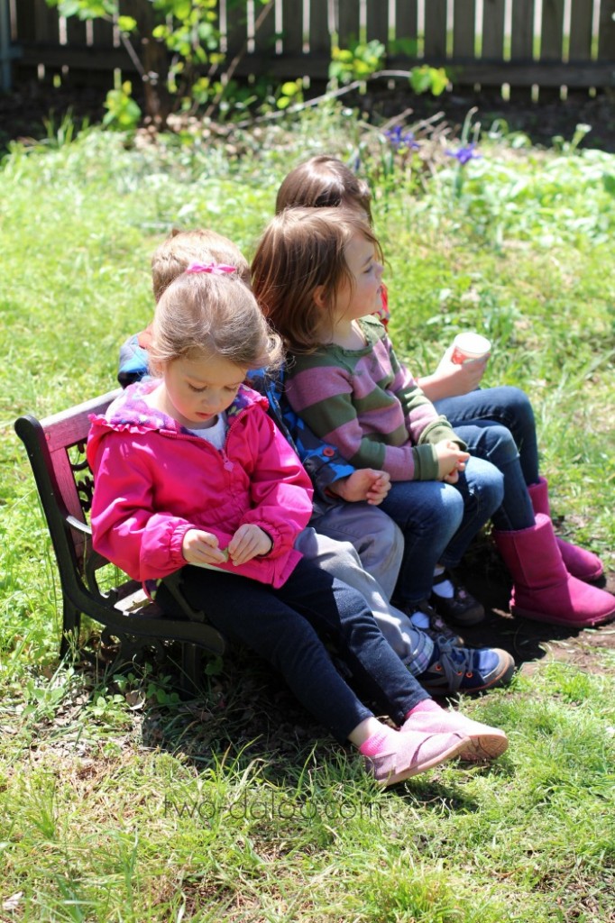 Children on a bench in the sunshine