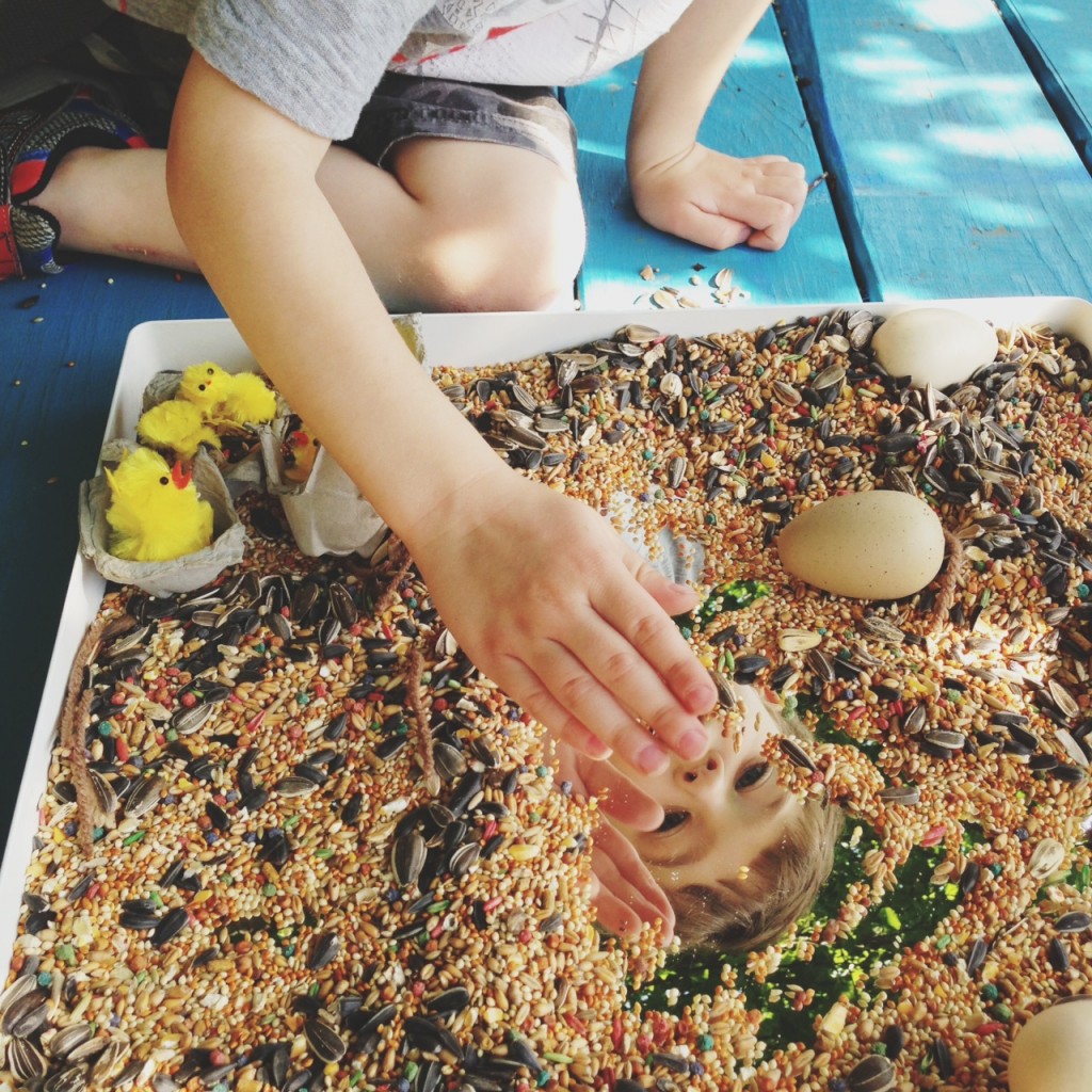 playing with mirrored sensory tray